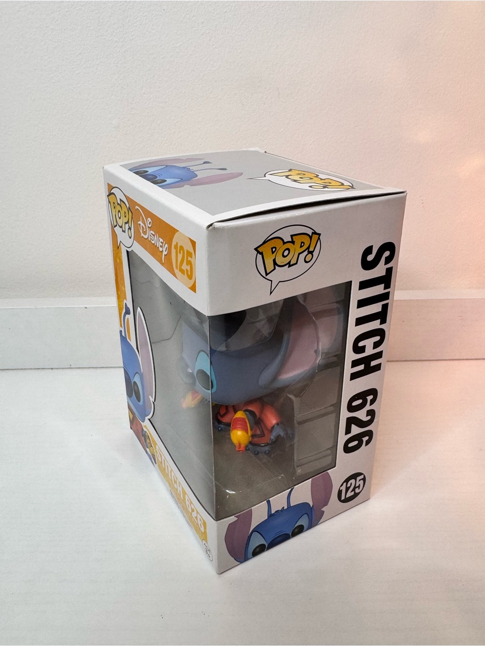Funko Pop! Disney Stitch in Red Outfit with Blue and Purple Accents - Picture 2 of 4